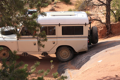 Land Rover Dormobile at bottom of rock